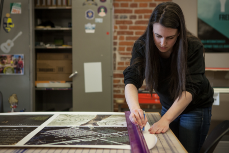 NBCCD Student working in Graphic Design classroom.