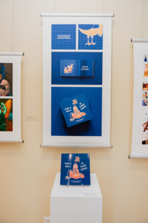 Micaila Rafuse's, Graphic Designer, work being exhibited at the NBCCD Alumni Show 2025.