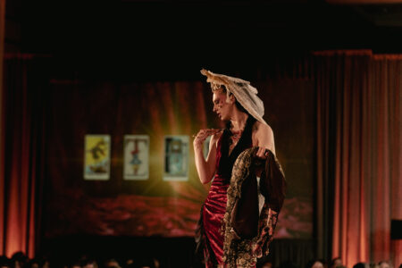 Model walking the runway in a design by Brennan Roy at the NBCCD Fashion Show 2025.