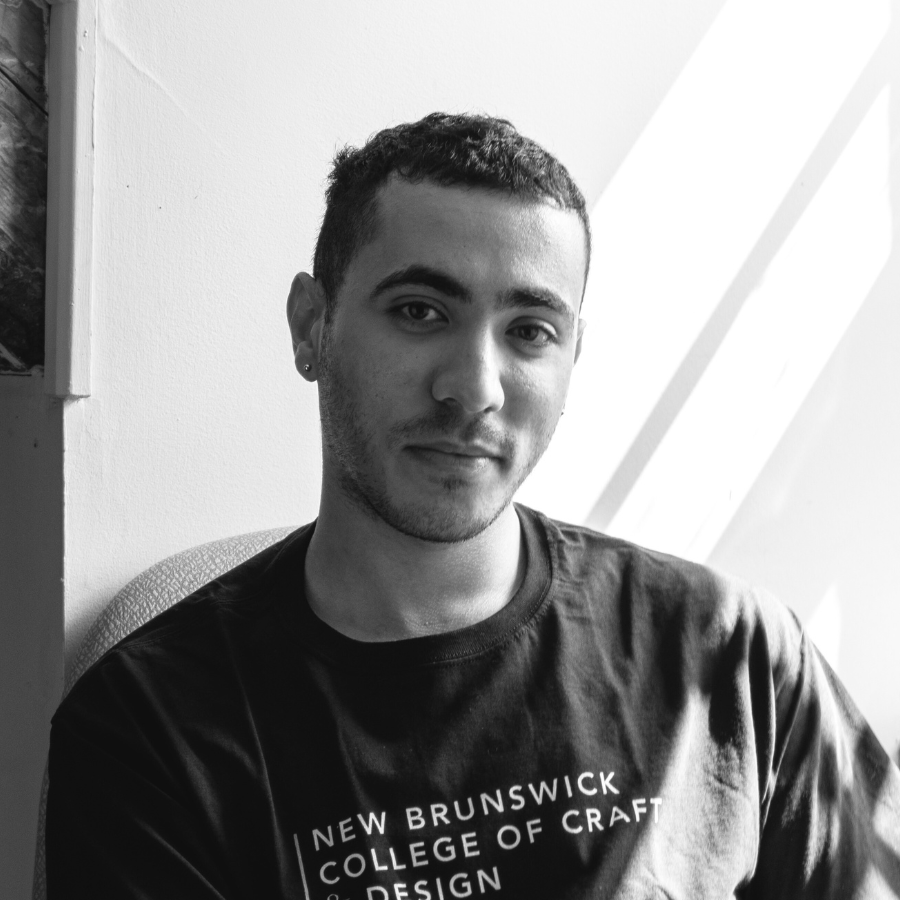 A portrait photo of Yousef Hussain, NBCCD's Student Life Coordinator