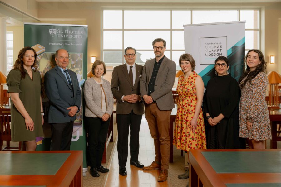 Leadership of STU and NBCCD pose for a photo on the St. Thomas University campus as the two institutions sign a diploma to degree partnership.